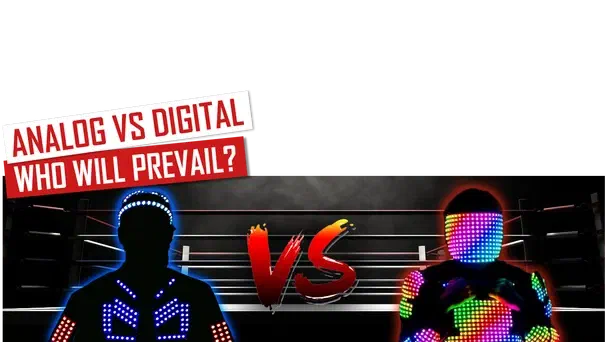 Analógové vs. digitálne – kto zvíťazí? – červeno-biele bannery nad dvoma tanečníkmi na opačných stranách boxerského ringu, jeden v LED kostýme s modrými analógovými LED segmentmi, druhý v kostýme pokrytom viacfarebnými pixelovými LED diódami, medzi nimi červené „VS“