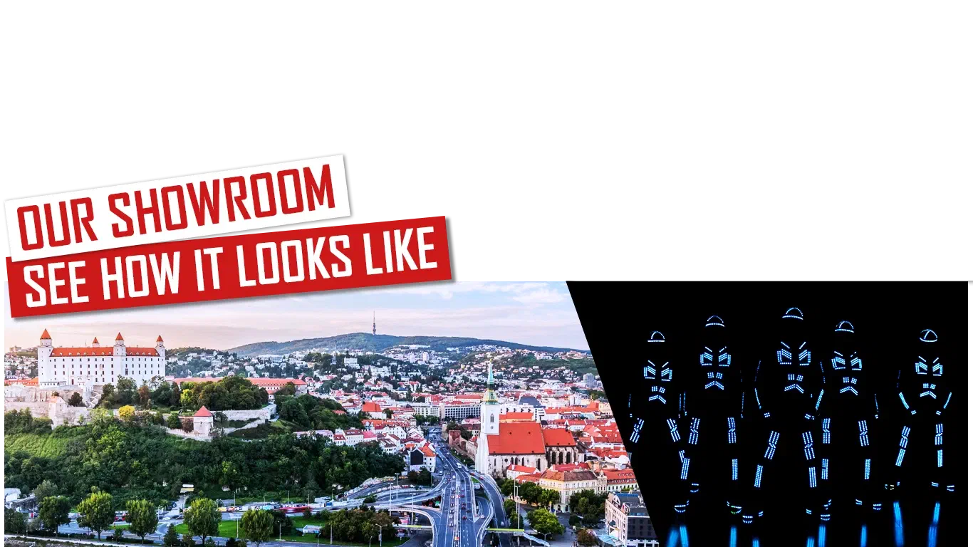 Our showroom – See how it looks like – red and white banners above a view of Bratislava with its castle and St Martin’s Cathedral, next to five Tron dancers in glowing blue LED suits