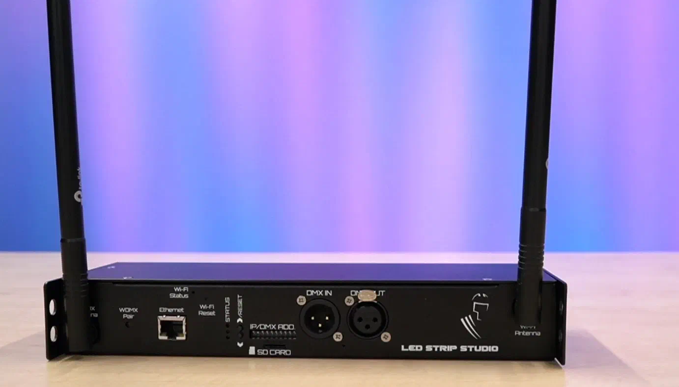 Pixel receiver and controller – a black LED Strip Studio unit with two Wi-Fi antennas, an Ethernet port, DMX in and out connectors, IP/DMX address switches and an SD card slot