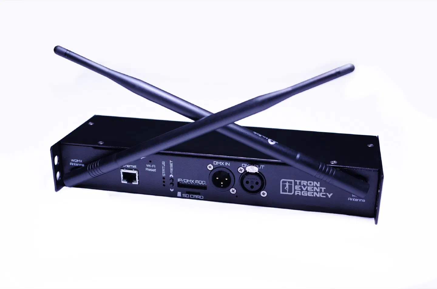 Pixel Tron Dance controller – a black box with WDMX and Wi-Fi antenna sockets, Ethernet, Wi-Fi reset, SD card, DMX in and DMX out and the Tron Event Agency logo, with two black antennas crossed over it