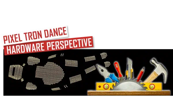 Pixel Tron Dance – Hardware perspective – red and white banners above the glowing pixel boards of a pixel LED suit, next to pliers, a screwdriver, a knife, a pencil and a hammer behind a saw blade and a spirit level