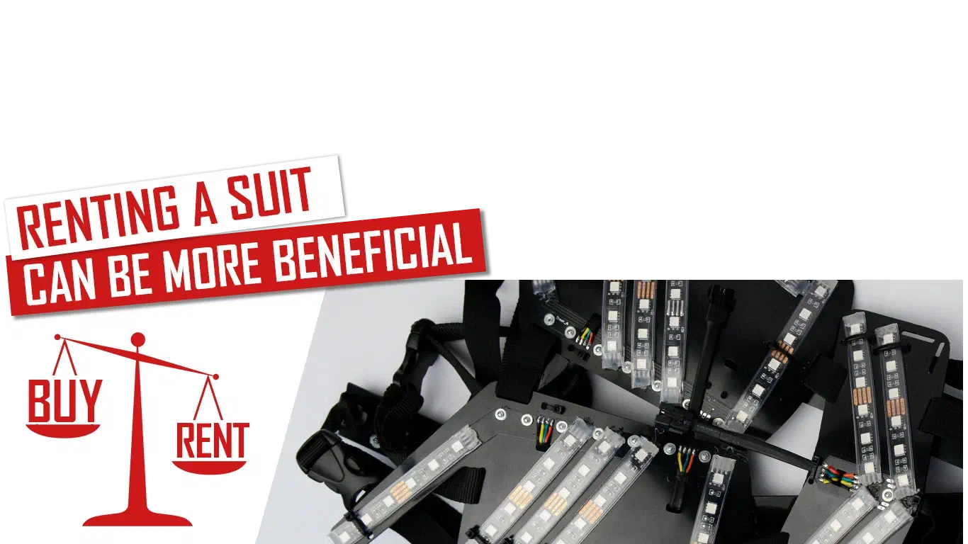 Renting a suit can be more beneficial – red and white banners above red scales weighing Buy and Rent, next to black LED suit parts with RGB LED strips