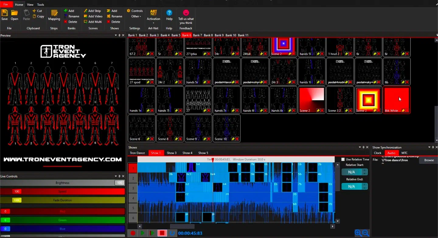 LED Strip Studio – the preview of seven numbered LED suits in red with the Tron Event Agency logo, a bank of scenes and the show timeline over the music waveform