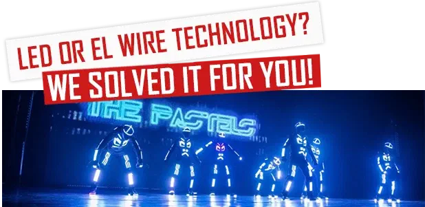 LED or EL wire technology? We solved it for you! – The Pastels dancers in glowing blue LED suits on a dark stage under a glowing “The Pastels” sign