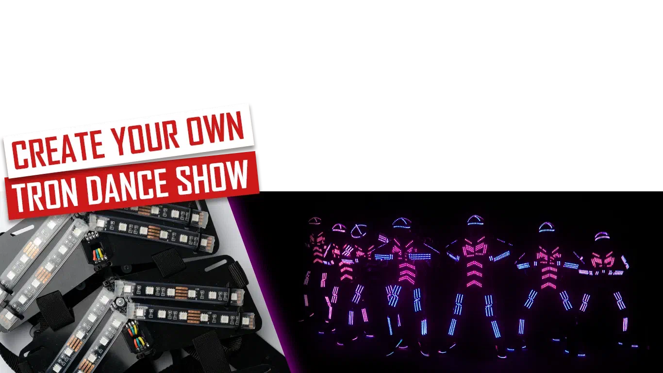 Create your own Tron Dance show – red and white banner above black LED suit parts with RGB LED strips, next to seven dancers in glowing pink and blue LED suits in the dark